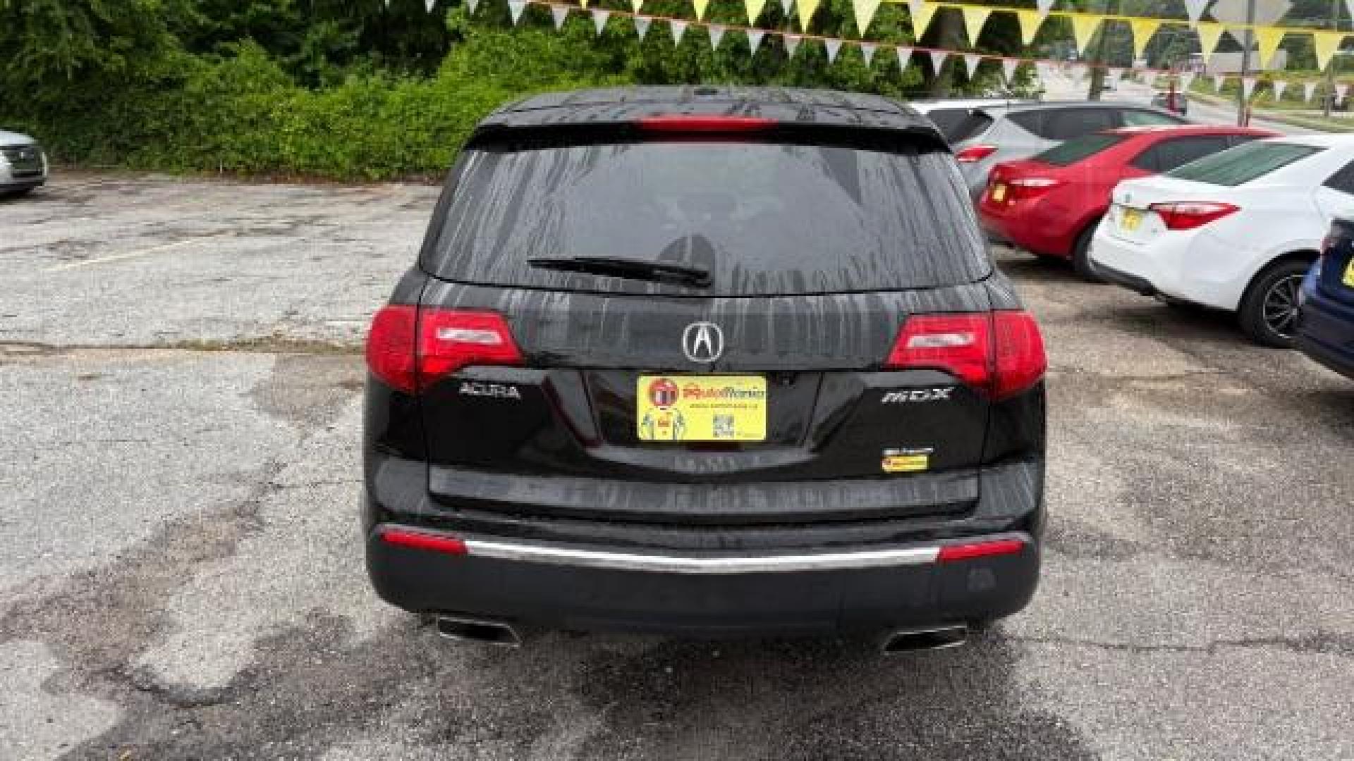 2011 Black Acura MDX Advance Package (2HNYD2H5XBH) with an 3.7L V-6 VTEC variable valve control engine, located at 1806 Veterans Memorial Hwy SW, Austell, GA, 30168, (770) 944-9558, 33.817959, -84.606987 - Photo#5
