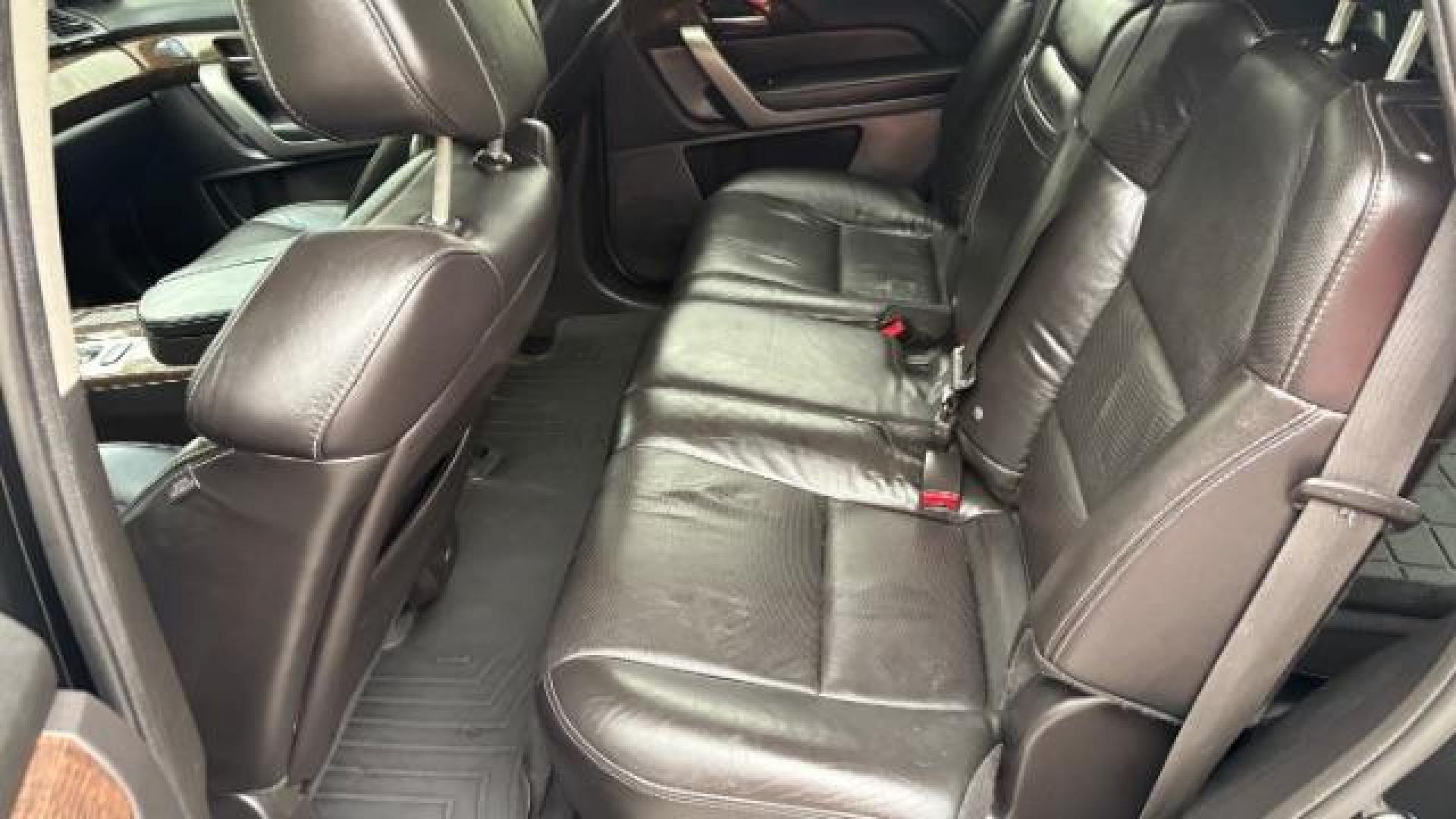 2011 Black Acura MDX Advance Package (2HNYD2H5XBH) with an 3.7L V-6 VTEC variable valve control engine, located at 1806 Veterans Memorial Hwy SW, Austell, GA, 30168, (770) 944-9558, 33.817959, -84.606987 - Photo#10