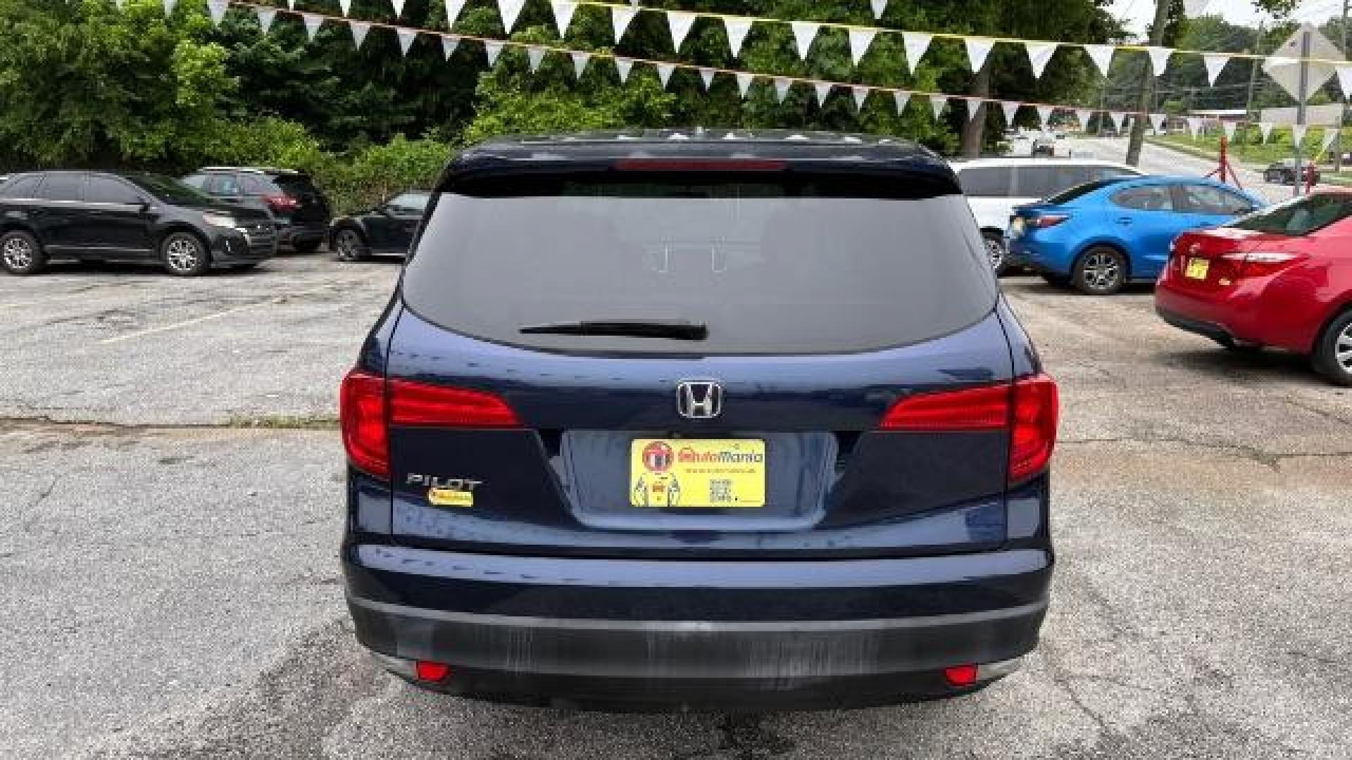 2016 Blue Honda Pilot EX (5FNYF5H3XGB) with an 3.5L V-6 gasoline direct injection engine, located at 1806 Veterans Memorial Hwy SW, Austell, GA, 30168, (770) 944-9558, 33.817959, -84.606987 - Photo#4