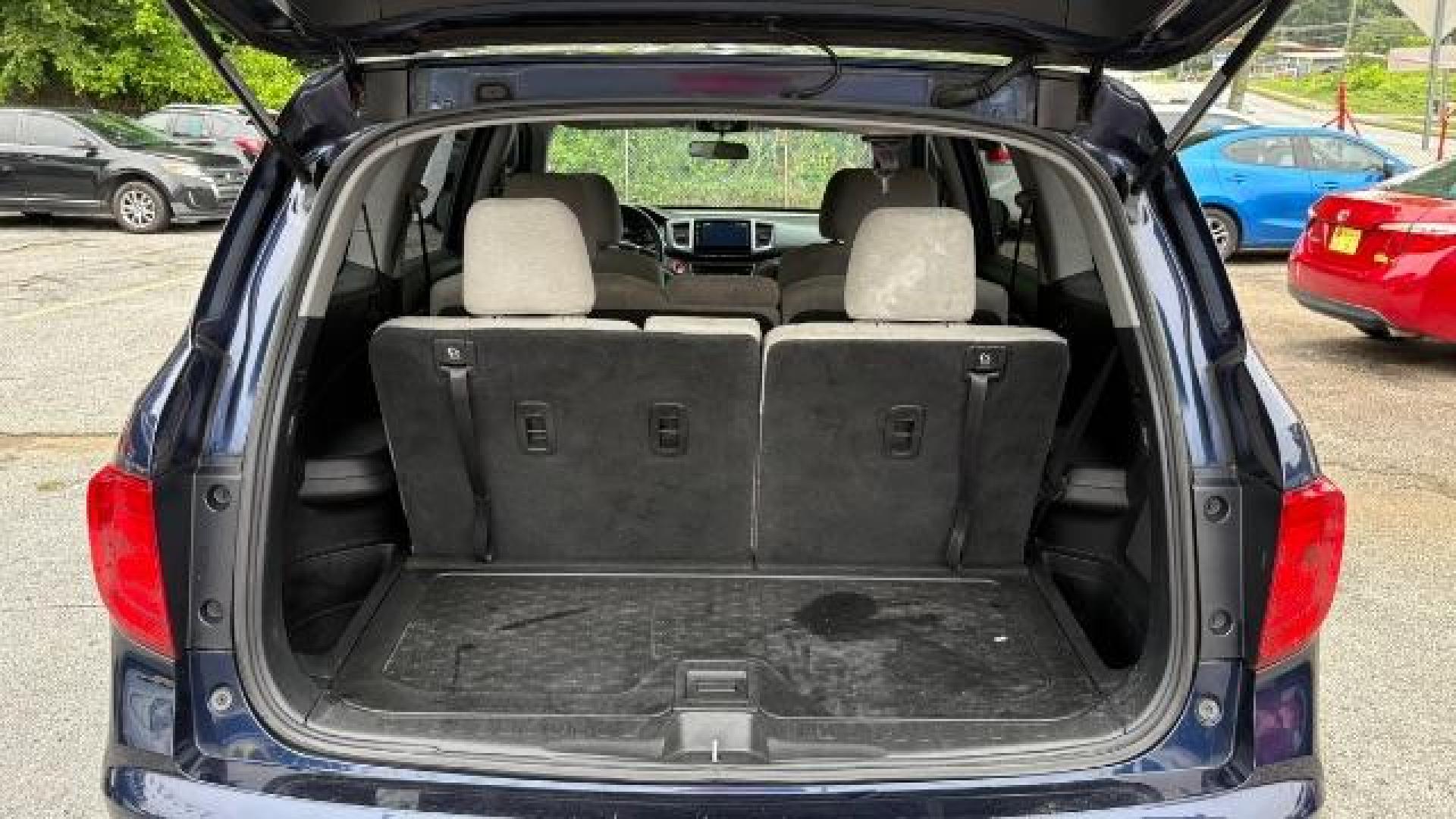 2016 Blue Honda Pilot EX (5FNYF5H3XGB) with an 3.5L V-6 gasoline direct injection engine, located at 1806 Veterans Memorial Hwy SW, Austell, GA, 30168, (770) 944-9558, 33.817959, -84.606987 - Photo#5