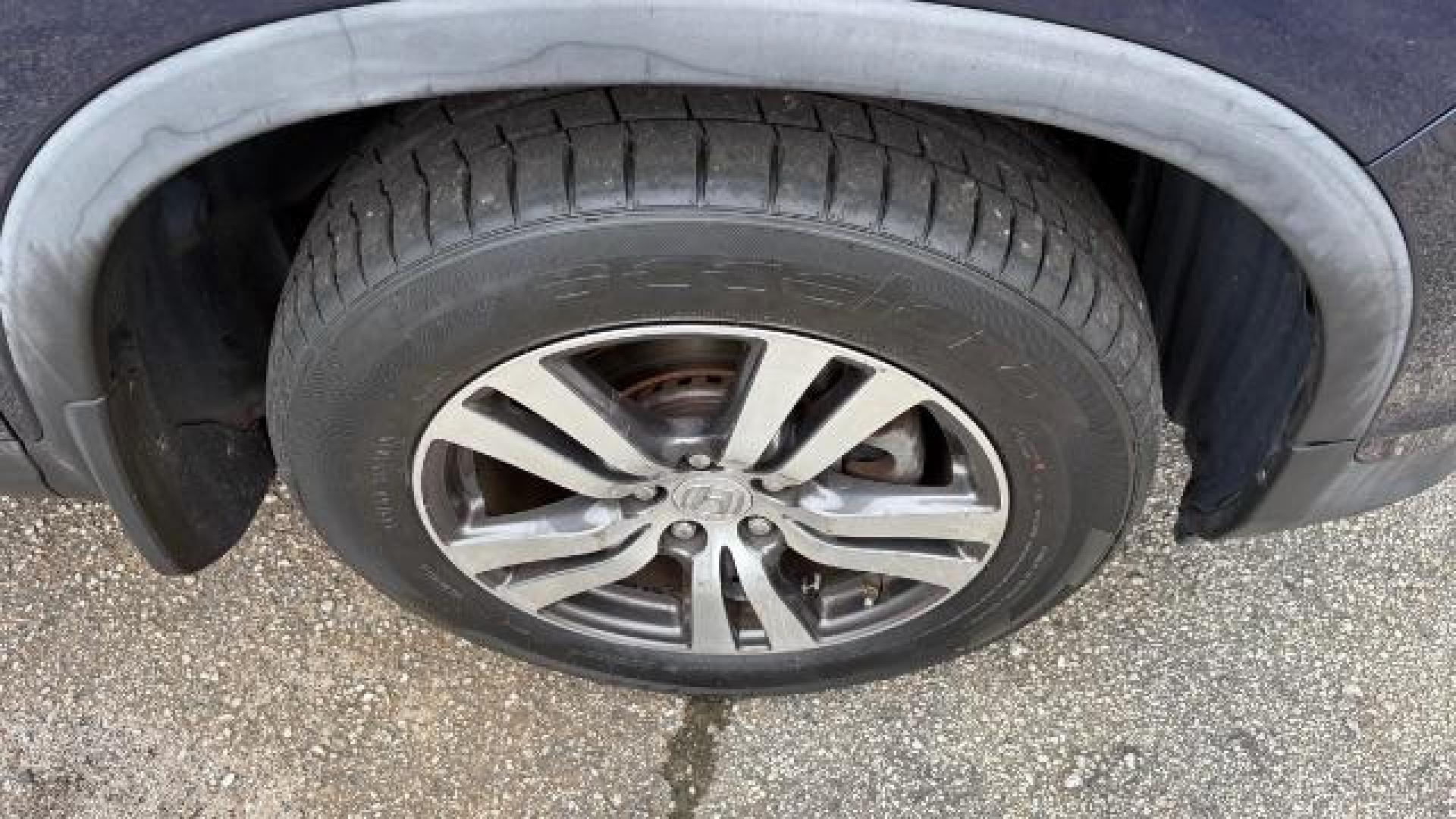 2016 Blue Honda Pilot EX (5FNYF5H3XGB) with an 3.5L V-6 gasoline direct injection engine, located at 1806 Veterans Memorial Hwy SW, Austell, GA, 30168, (770) 944-9558, 33.817959, -84.606987 - Photo#11