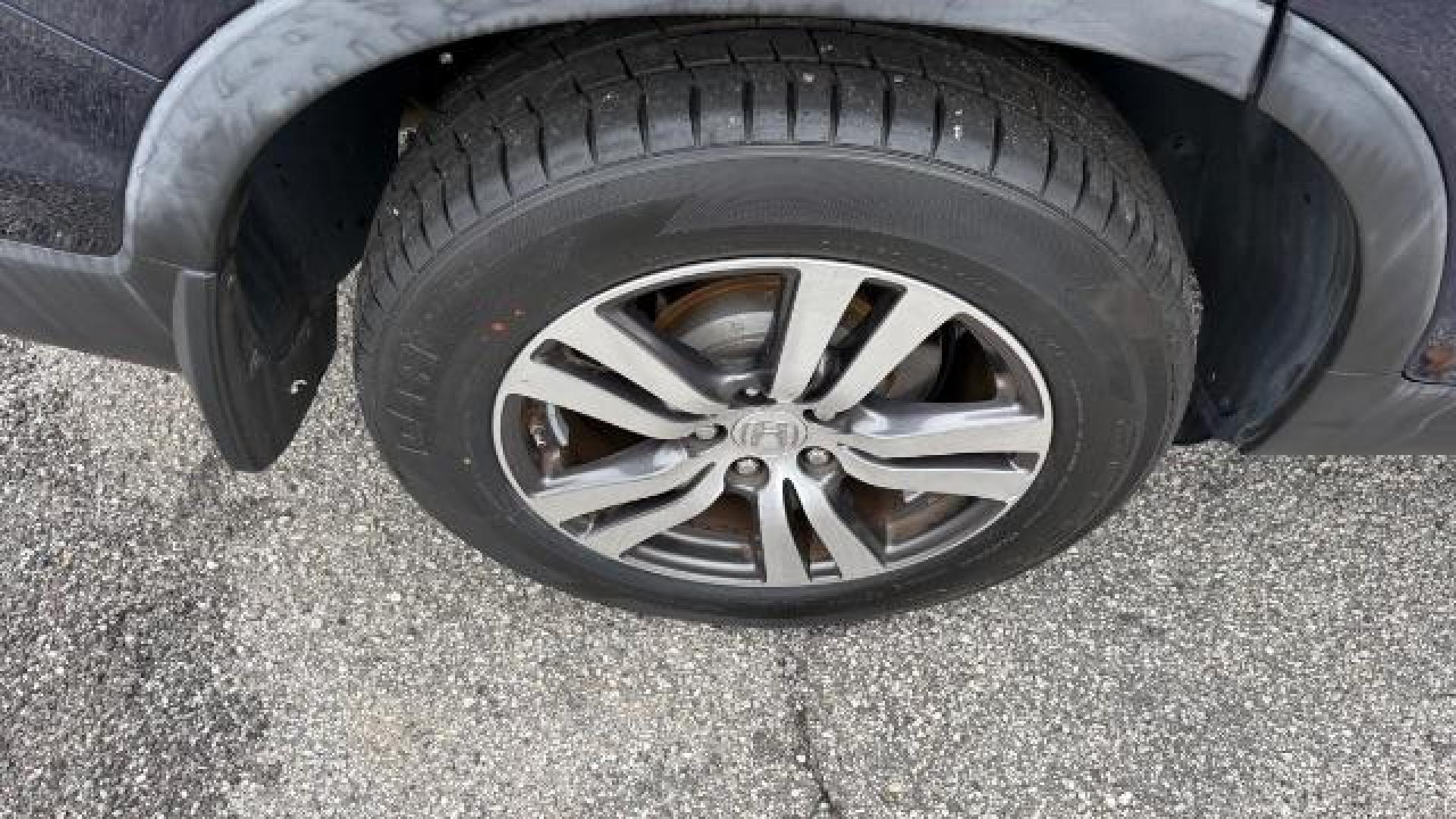 2016 Blue Honda Pilot EX (5FNYF5H3XGB) with an 3.5L V-6 gasoline direct injection engine, located at 1806 Veterans Memorial Hwy SW, Austell, GA, 30168, (770) 944-9558, 33.817959, -84.606987 - Photo#12