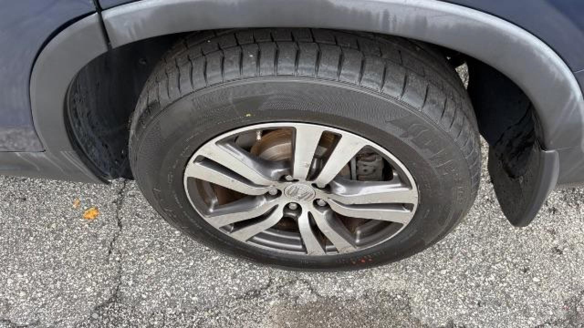 2016 Blue Honda Pilot EX (5FNYF5H3XGB) with an 3.5L V-6 gasoline direct injection engine, located at 1806 Veterans Memorial Hwy SW, Austell, GA, 30168, (770) 944-9558, 33.817959, -84.606987 - Photo#13
