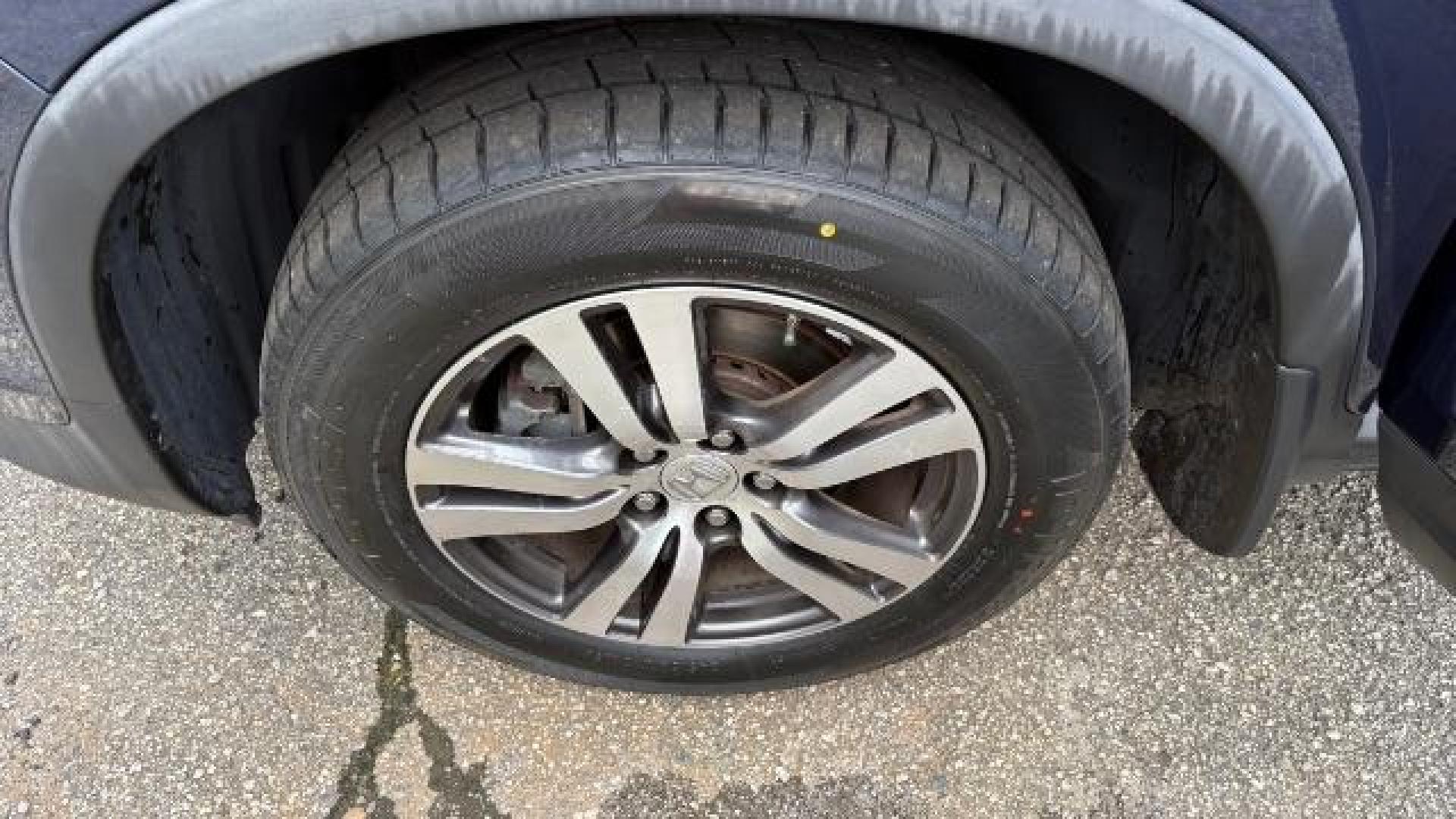 2016 Blue Honda Pilot EX (5FNYF5H3XGB) with an 3.5L V-6 gasoline direct injection engine, located at 1806 Veterans Memorial Hwy SW, Austell, GA, 30168, (770) 944-9558, 33.817959, -84.606987 - Photo#14