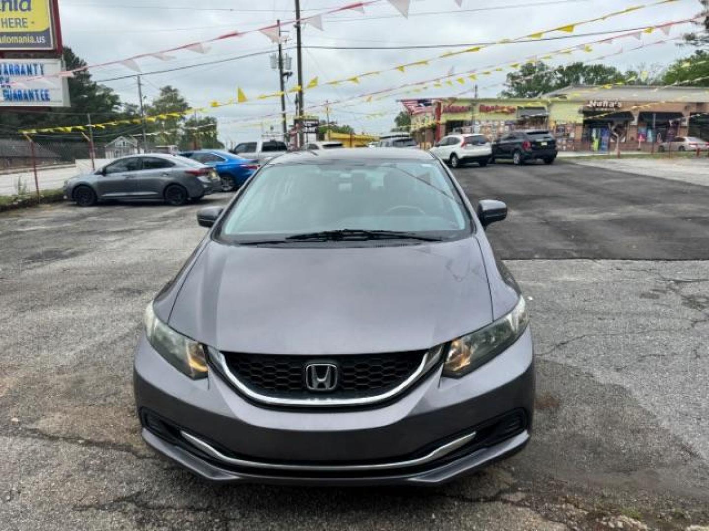 2015 Gray Honda Civic LX (19XFB2F57FE) with an 1.8L I-4 i-VTEC variable valve control engine, located at 1806 Veterans Memorial Hwy SW, Austell, GA, 30168, (770) 944-9558, 33.817959, -84.606987 - Photo#1