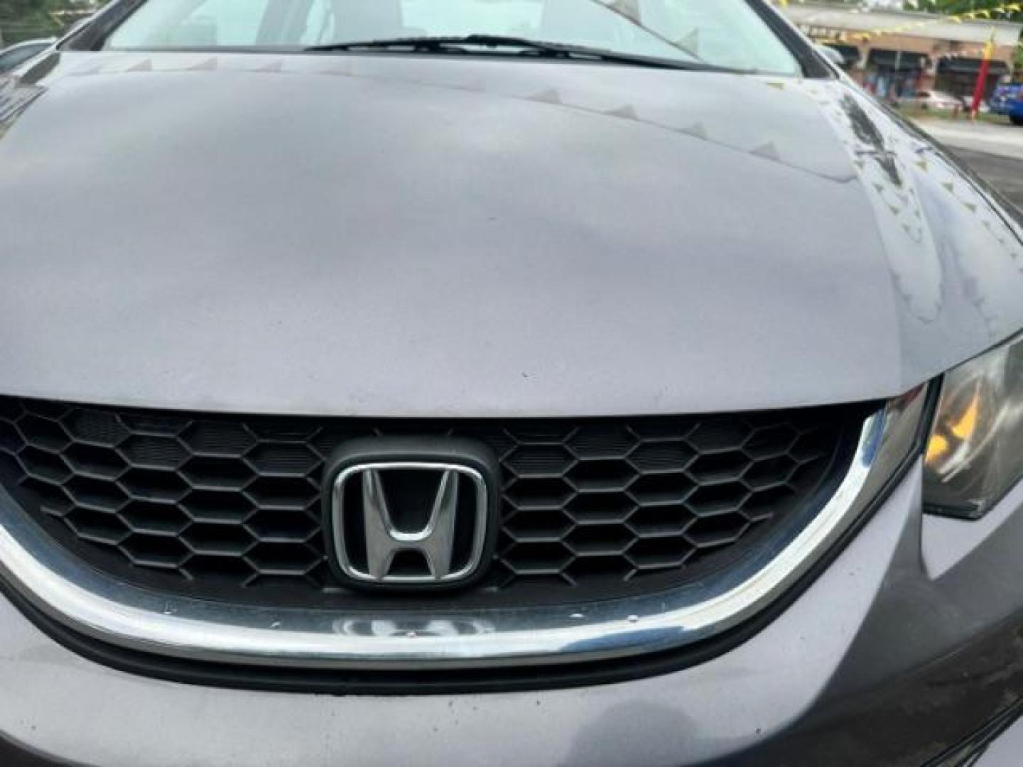 2015 Gray Honda Civic LX (19XFB2F57FE) with an 1.8L I-4 i-VTEC variable valve control engine, located at 1806 Veterans Memorial Hwy SW, Austell, GA, 30168, (770) 944-9558, 33.817959, -84.606987 - Photo#16