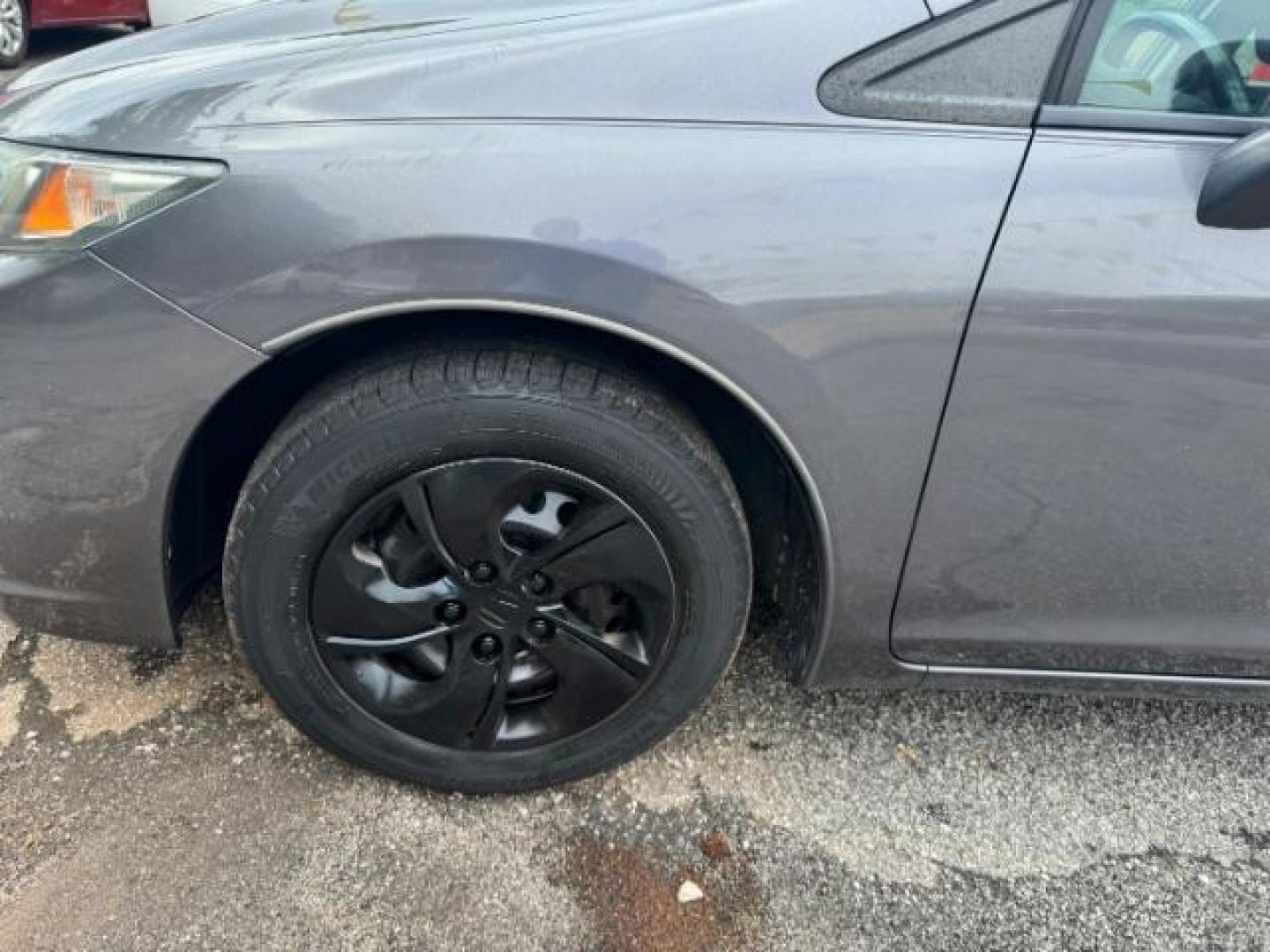 2015 Gray Honda Civic LX (19XFB2F57FE) with an 1.8L I-4 i-VTEC variable valve control engine, located at 1806 Veterans Memorial Hwy SW, Austell, GA, 30168, (770) 944-9558, 33.817959, -84.606987 - Photo#17