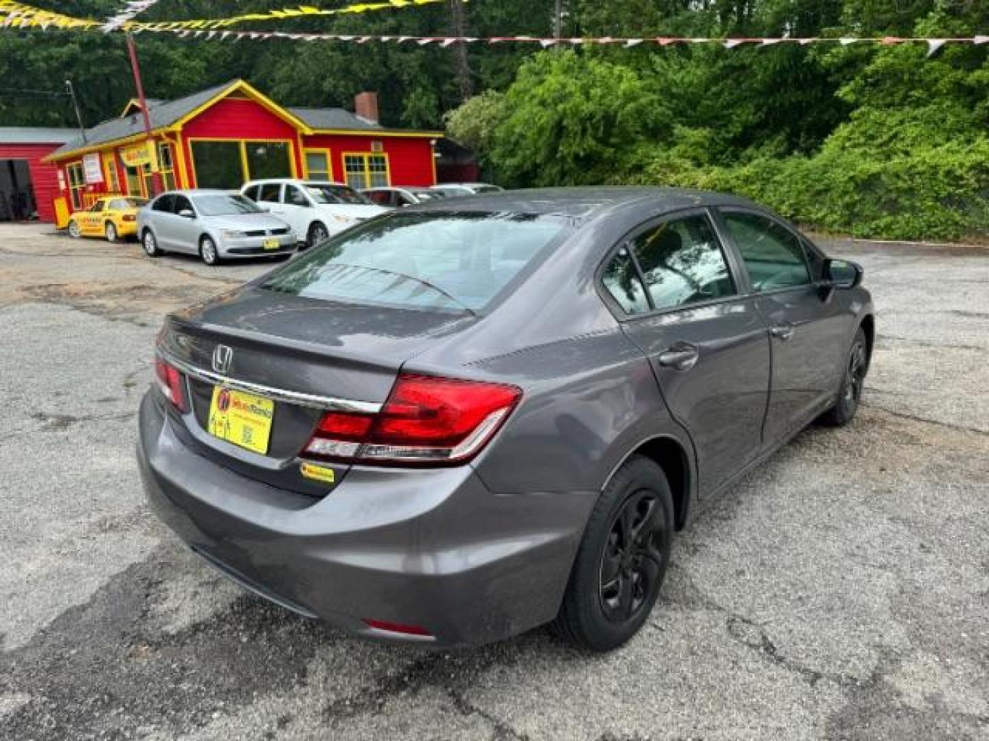2015 Gray Honda Civic LX (19XFB2F57FE) with an 1.8L I-4 i-VTEC variable valve control engine, located at 1806 Veterans Memorial Hwy SW, Austell, GA, 30168, (770) 944-9558, 33.817959, -84.606987 - Photo#3