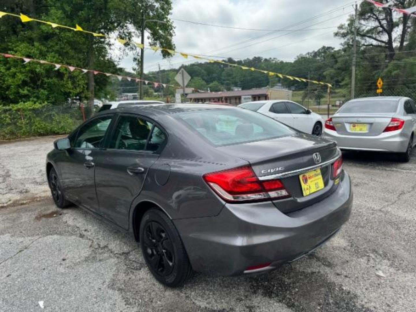 2015 Gray Honda Civic LX (19XFB2F57FE) with an 1.8L I-4 i-VTEC variable valve control engine, located at 1806 Veterans Memorial Hwy SW, Austell, GA, 30168, (770) 944-9558, 33.817959, -84.606987 - Photo#5