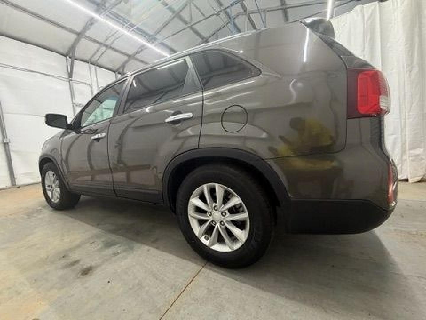 2014 Gray Kia Sorento EX V6 (5XYKU4A75EG) with an Lambda II 3.3L V-6 g engine, located at 1806 Veterans Memorial Hwy SW, Austell, GA, 30168, (770) 944-9558, 33.817959, -84.606987- Photo#1
