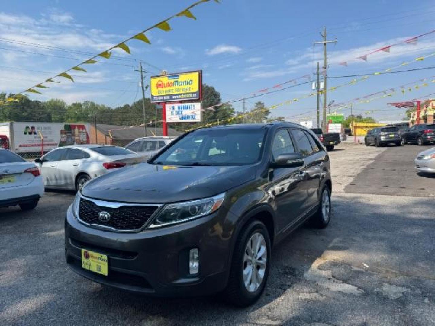 2014 Gray Kia Sorento EX V6 (5XYKU4A75EG) with an Lambda II 3.3L V-6 gasoline direct injection engine, located at 1806 Veterans Memorial Hwy SW, Austell, GA, 30168, (770) 944-9558, 33.817959, -84.606987 - Photo#0