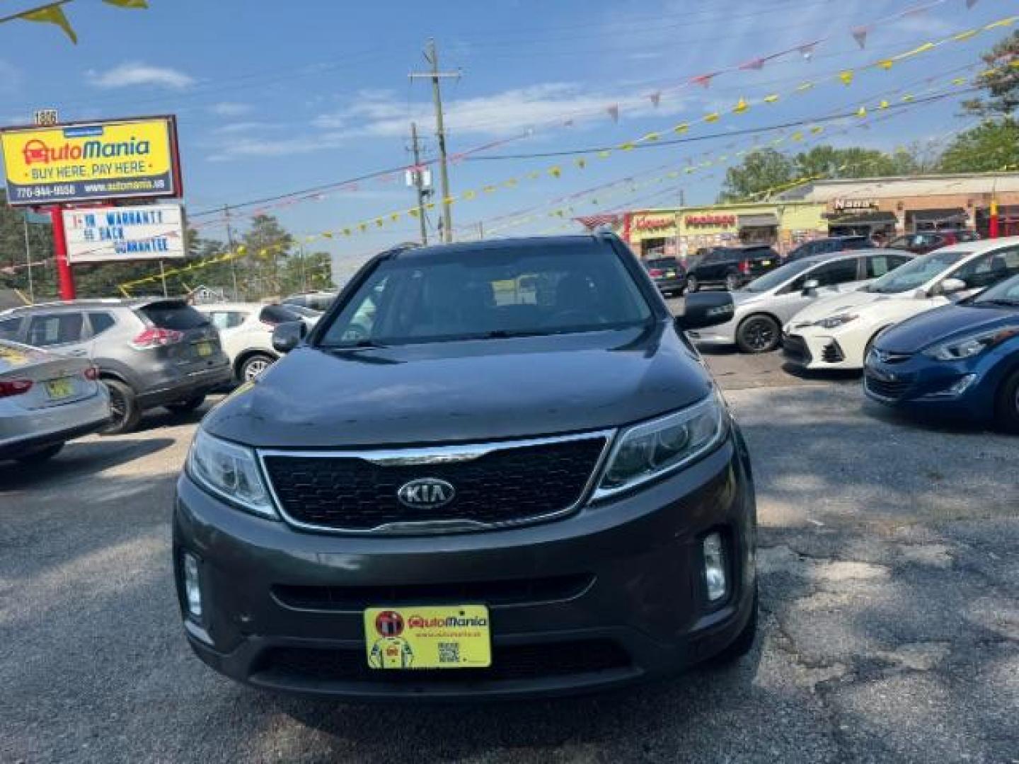 2014 Gray Kia Sorento EX V6 (5XYKU4A75EG) with an Lambda II 3.3L V-6 gasoline direct injection engine, located at 1806 Veterans Memorial Hwy SW, Austell, GA, 30168, (770) 944-9558, 33.817959, -84.606987 - Photo#1