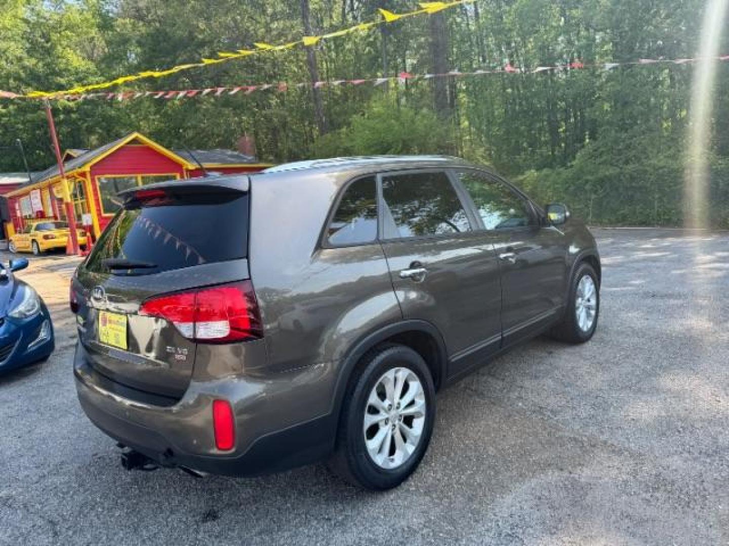 2014 Gray Kia Sorento EX V6 (5XYKU4A75EG) with an Lambda II 3.3L V-6 gasoline direct injection engine, located at 1806 Veterans Memorial Hwy SW, Austell, GA, 30168, (770) 944-9558, 33.817959, -84.606987 - Photo#3