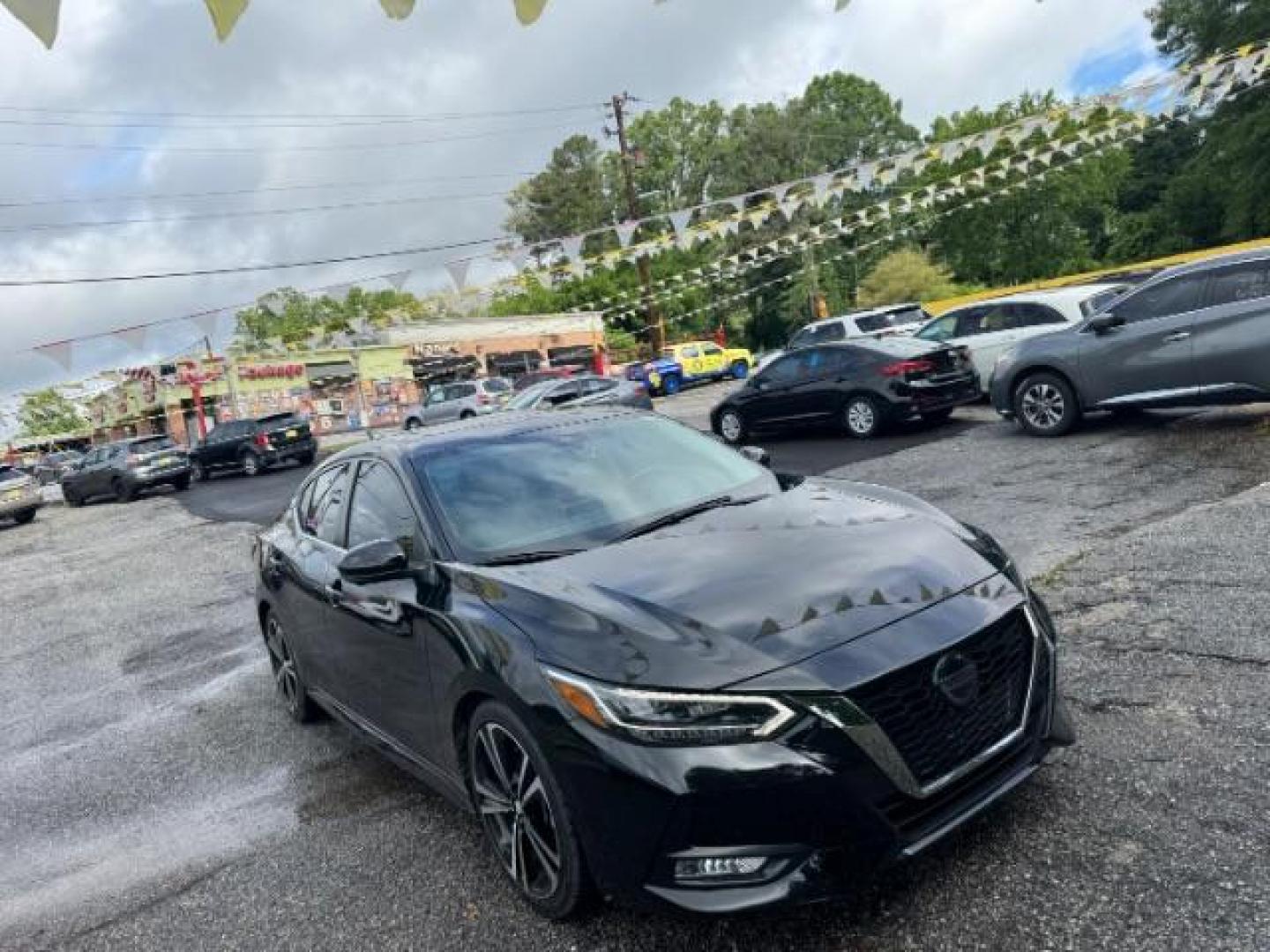 2021 Black Nissan Sentra SR Xtronic CVT (3N1AB8DV9MY) with an 2L I-4 gasoline direct injection engine, located at 1806 Veterans Memorial Hwy SW, Austell, GA, 30168, (770) 944-9558, 33.817959, -84.606987 - Photo#2