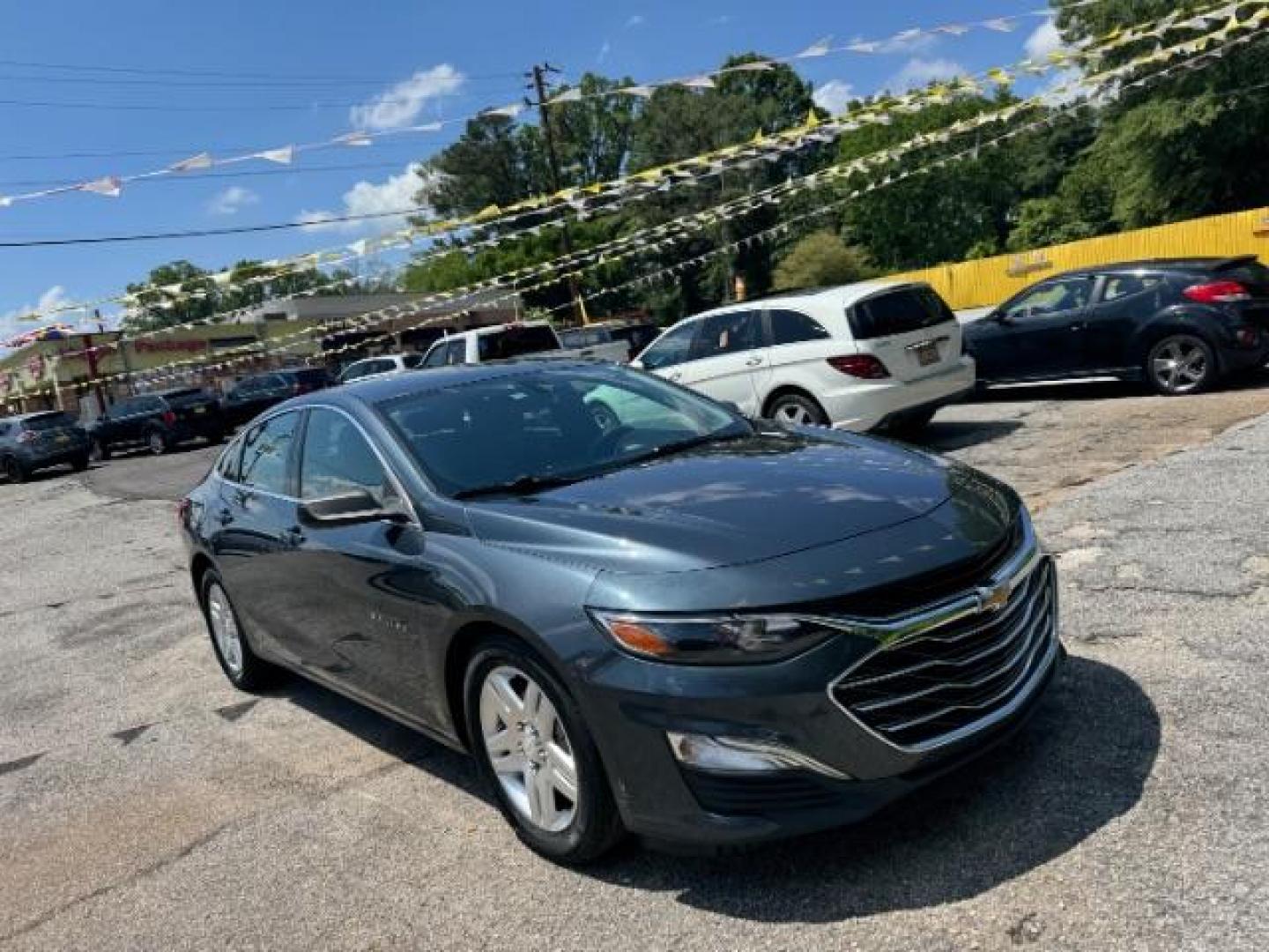 2019 Gray Chevrolet Malibu 1LS (1G1ZB5ST8KF) with an ECOTEC 1.5L I-4 gasoline direct injection engine, located at 1806 Veterans Memorial Hwy SW, Austell, GA, 30168, (770) 944-9558, 33.817959, -84.606987 - Photo#2