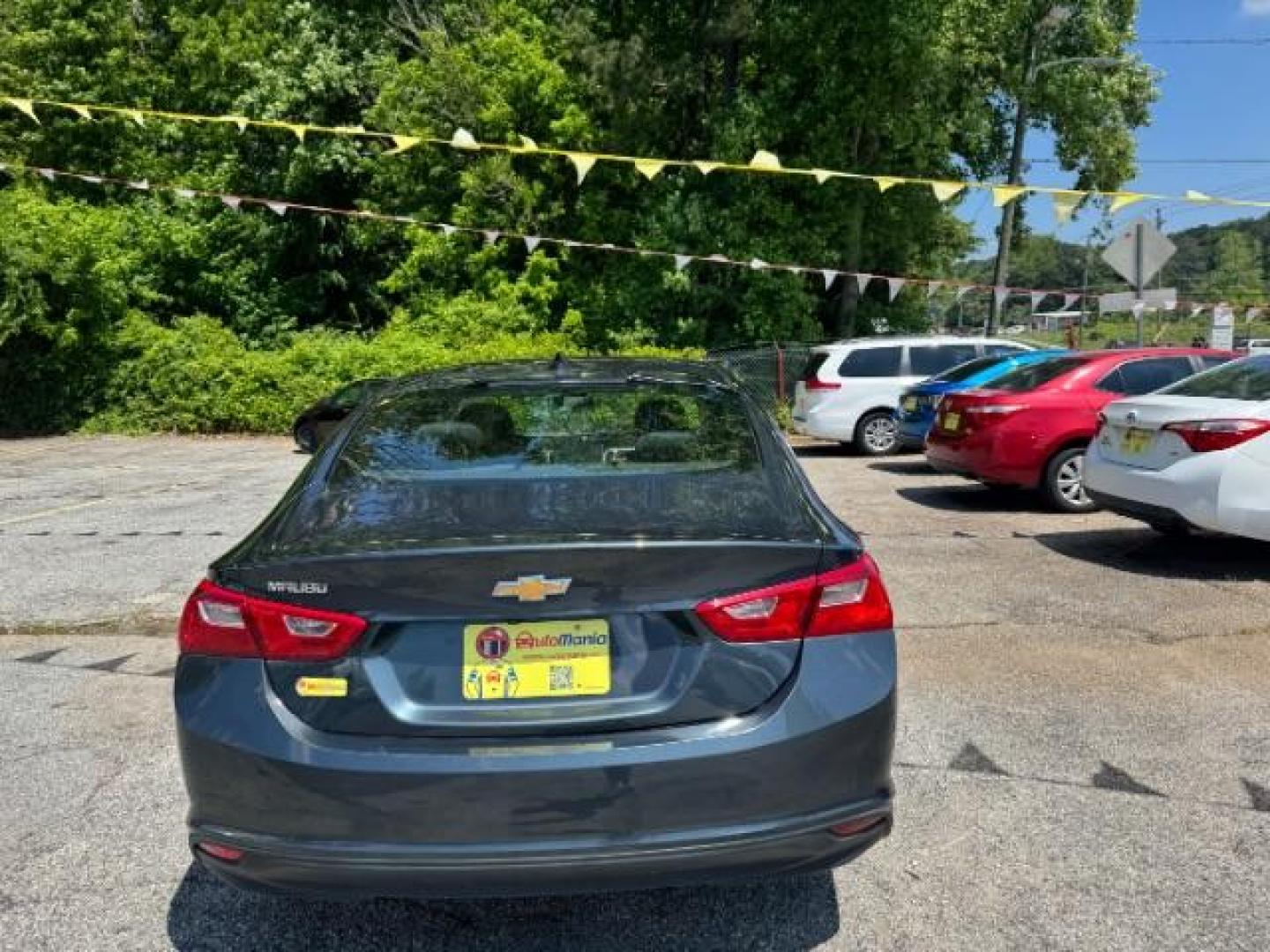 2019 Gray Chevrolet Malibu 1LS (1G1ZB5ST8KF) with an ECOTEC 1.5L I-4 gasoline direct injection engine, located at 1806 Veterans Memorial Hwy SW, Austell, GA, 30168, (770) 944-9558, 33.817959, -84.606987 - Photo#4