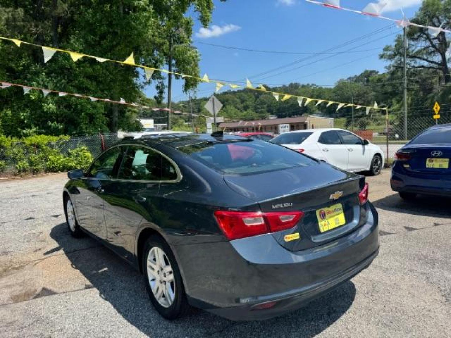 2019 Gray Chevrolet Malibu 1LS (1G1ZB5ST8KF) with an ECOTEC 1.5L I-4 gasoline direct injection engine, located at 1806 Veterans Memorial Hwy SW, Austell, GA, 30168, (770) 944-9558, 33.817959, -84.606987 - Photo#5