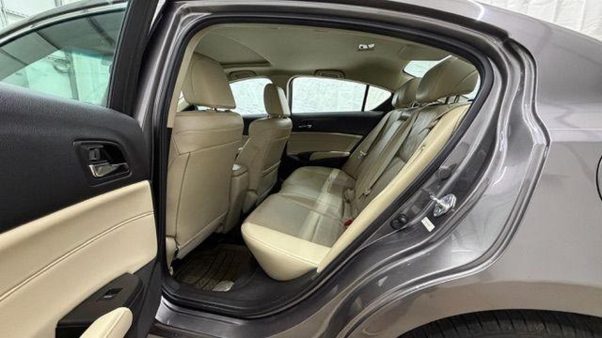 2013 Gray Acura ILX Hybrid 1.5L (19VDE3F7XDE) with an 1.5L I-4 i-VTEC variable valve control engine, located at 1806 Veterans Memorial Hwy SW, Austell, GA, 30168, (770) 944-9558, 33.817959, -84.606987 - Photo#14