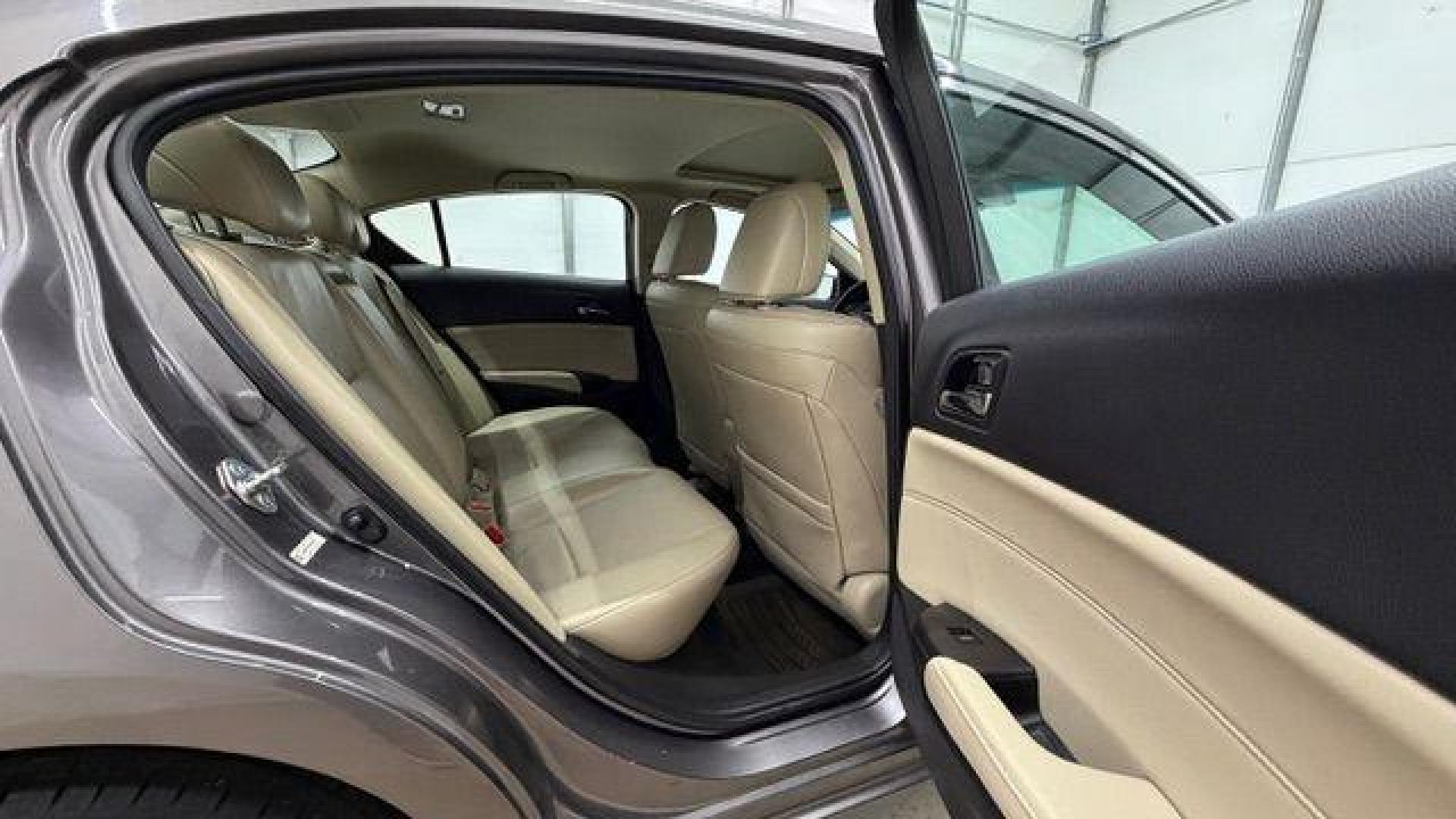 2013 Gray Acura ILX Hybrid 1.5L (19VDE3F7XDE) with an 1.5L I-4 i-VTEC variable valve control engine, located at 1806 Veterans Memorial Hwy SW, Austell, GA, 30168, (770) 944-9558, 33.817959, -84.606987 - Photo#16