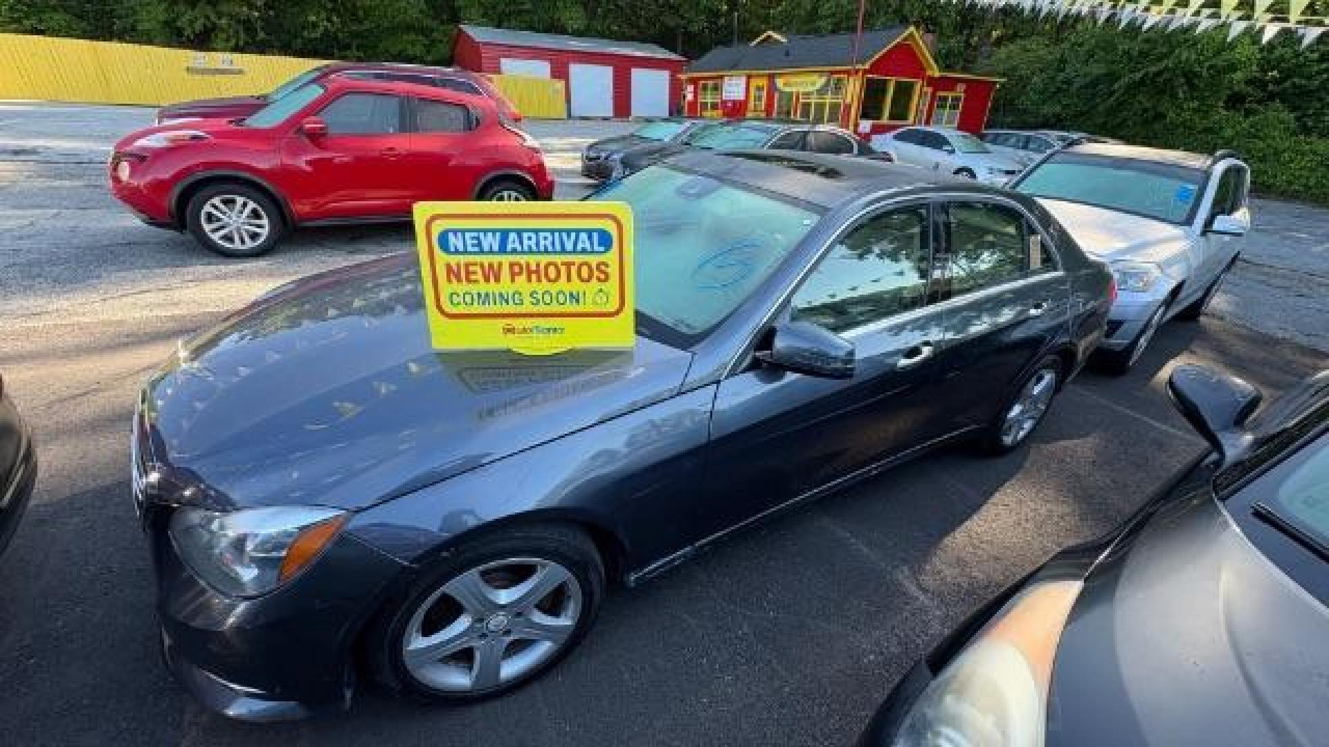 2014 Blue Mercedes-Benz E 350 4MATIC (WDDHF8JB0EA) with an 3.5L V-6 gasoline direct injection engine, located at 1806 Veterans Memorial Hwy SW, Austell, GA, 30168, (770) 944-9558, 33.817959, -84.606987 - Photo#0
