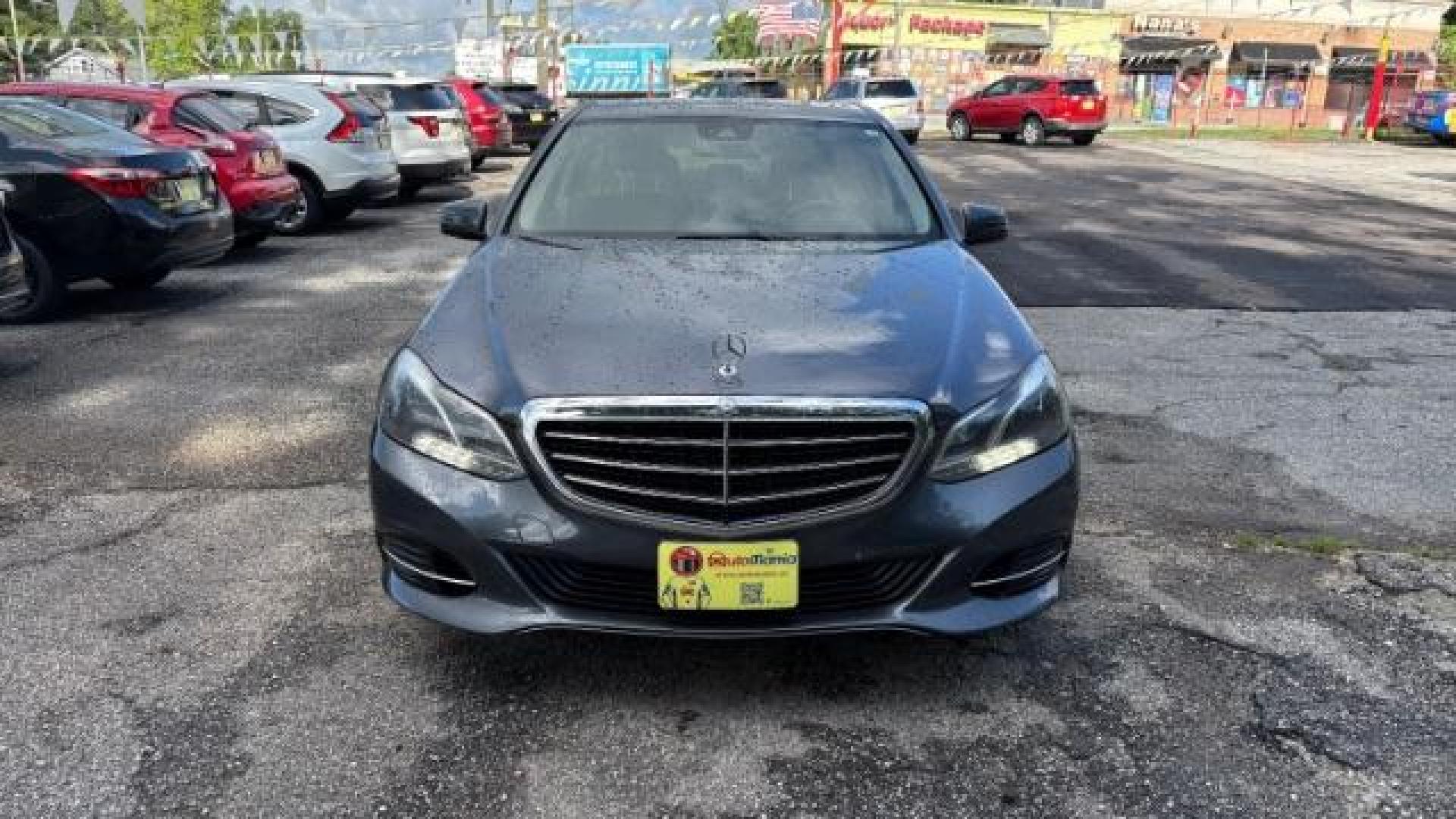 2014 Gray Mercedes-Benz E 350 4MATIC (WDDHF8JB0EA) with an 3.5L V-6 gasoline direct injection engine, located at 1806 Veterans Memorial Hwy SW, Austell, GA, 30168, (770) 944-9558, 33.817959, -84.606987 - Photo#1