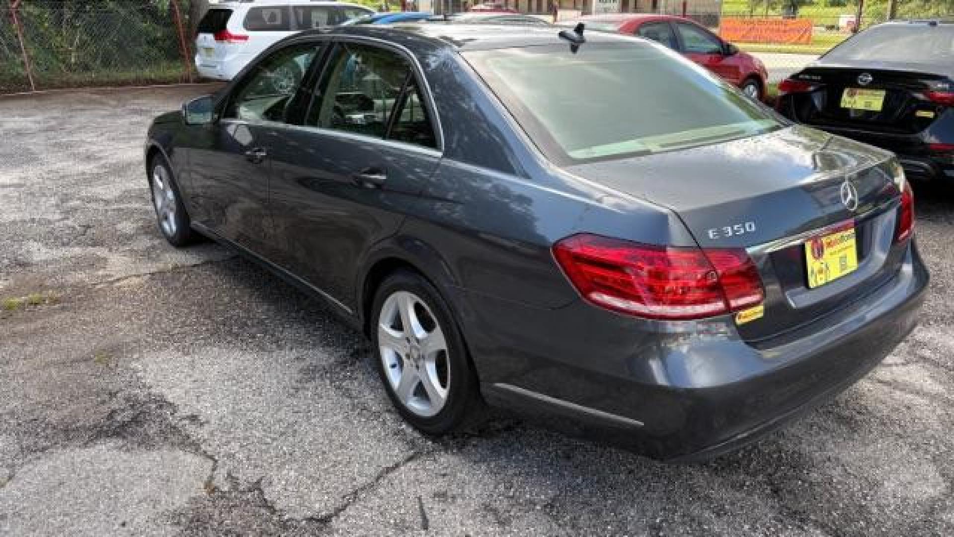 2014 Gray Mercedes-Benz E 350 4MATIC (WDDHF8JB0EA) with an 3.5L V-6 gasoline direct injection engine, located at 1806 Veterans Memorial Hwy SW, Austell, GA, 30168, (770) 944-9558, 33.817959, -84.606987 - Photo#5
