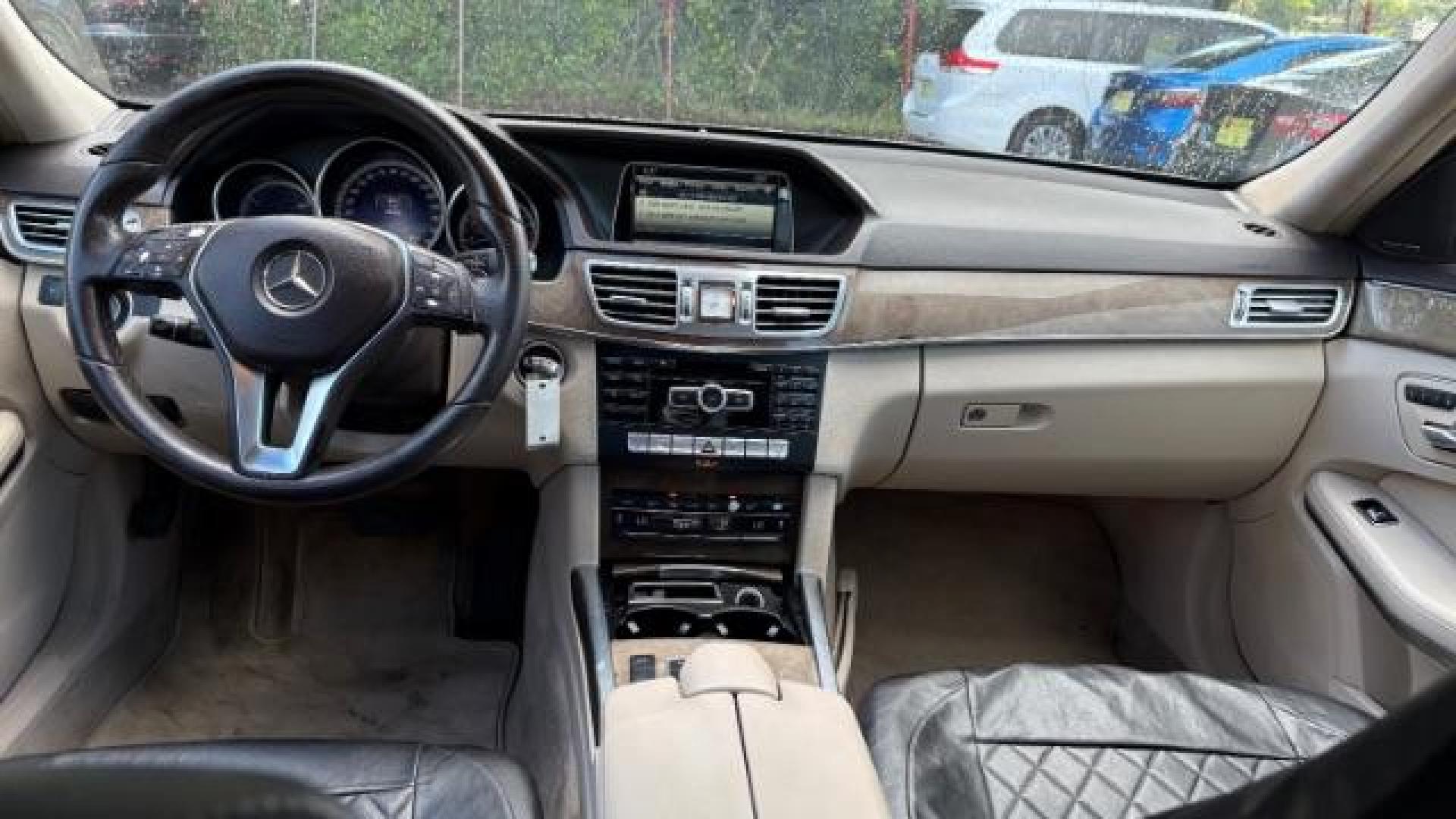 2014 Gray Mercedes-Benz E 350 4MATIC (WDDHF8JB0EA) with an 3.5L V-6 gasoline direct injection engine, located at 1806 Veterans Memorial Hwy SW, Austell, GA, 30168, (770) 944-9558, 33.817959, -84.606987 - Photo#10