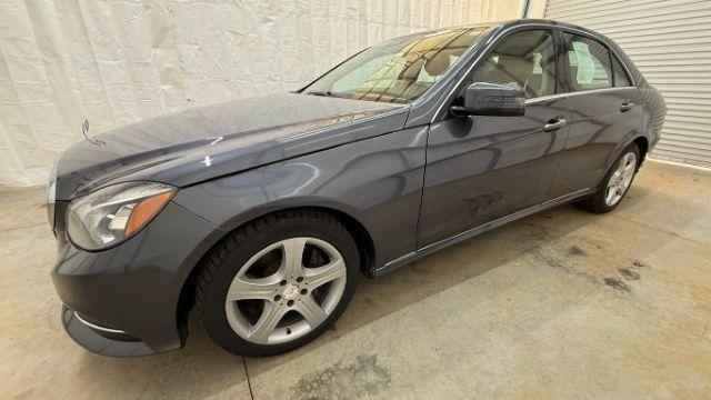 2014 Gray Mercedes-Benz E 350 4MATIC (WDDHF8JB0EA) with an 3.5L V-6 gasoline direct injection engine, located at 1806 Veterans Memorial Hwy SW, Austell, GA, 30168, (770) 944-9558, 33.817959, -84.606987 - Photo#1