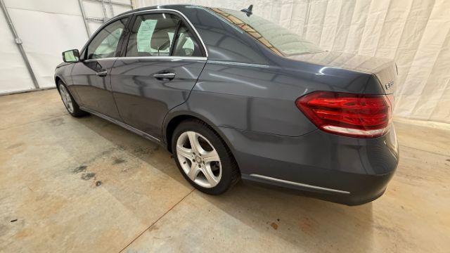 2014 Gray Mercedes-Benz E 350 4MATIC (WDDHF8JB0EA) with an 3.5L V-6 gasoline direct injection engine, located at 1806 Veterans Memorial Hwy SW, Austell, GA, 30168, (770) 944-9558, 33.817959, -84.606987 - Photo#2