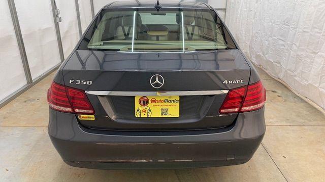 2014 Gray Mercedes-Benz E 350 4MATIC (WDDHF8JB0EA) with an 3.5L V-6 gasoline direct injection engine, located at 1806 Veterans Memorial Hwy SW, Austell, GA, 30168, (770) 944-9558, 33.817959, -84.606987 - Photo#4