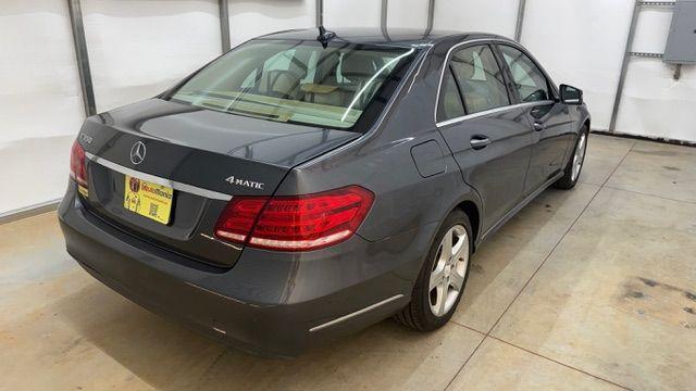 2014 Gray Mercedes-Benz E 350 4MATIC (WDDHF8JB0EA) with an 3.5L V-6 gasoline direct injection engine, located at 1806 Veterans Memorial Hwy SW, Austell, GA, 30168, (770) 944-9558, 33.817959, -84.606987 - Photo#5