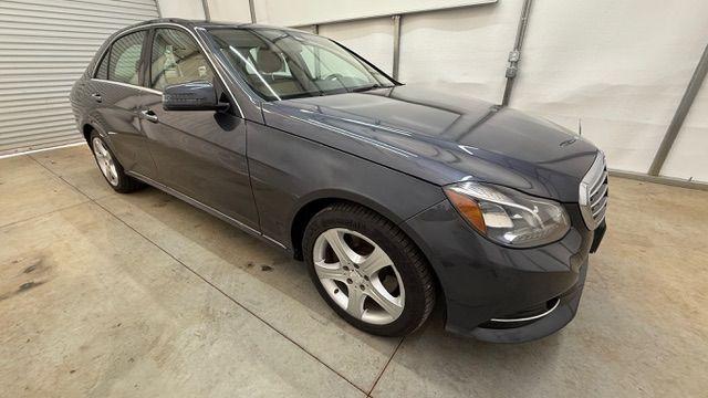 2014 Gray Mercedes-Benz E 350 4MATIC (WDDHF8JB0EA) with an 3.5L V-6 gasoline direct injection engine, located at 1806 Veterans Memorial Hwy SW, Austell, GA, 30168, (770) 944-9558, 33.817959, -84.606987 - Photo#7