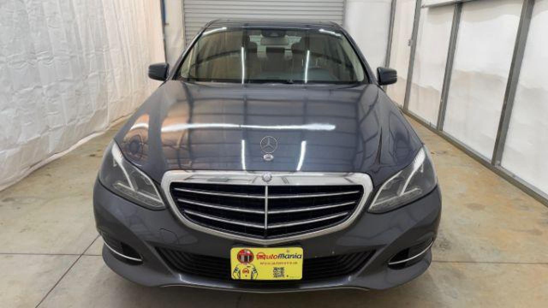 2014 Gray Mercedes-Benz E 350 4MATIC (WDDHF8JB0EA) with an 3.5L V-6 gasoline direct injection engine, located at 1806 Veterans Memorial Hwy SW, Austell, GA, 30168, (770) 944-9558, 33.817959, -84.606987 - Photo#8
