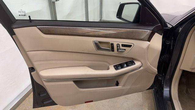 2014 Gray Mercedes-Benz E 350 4MATIC (WDDHF8JB0EA) with an 3.5L V-6 gasoline direct injection engine, located at 1806 Veterans Memorial Hwy SW, Austell, GA, 30168, (770) 944-9558, 33.817959, -84.606987 - Photo#9