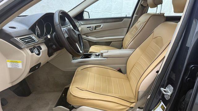 2014 Gray Mercedes-Benz E 350 4MATIC (WDDHF8JB0EA) with an 3.5L V-6 gasoline direct injection engine, located at 1806 Veterans Memorial Hwy SW, Austell, GA, 30168, (770) 944-9558, 33.817959, -84.606987 - Photo#10