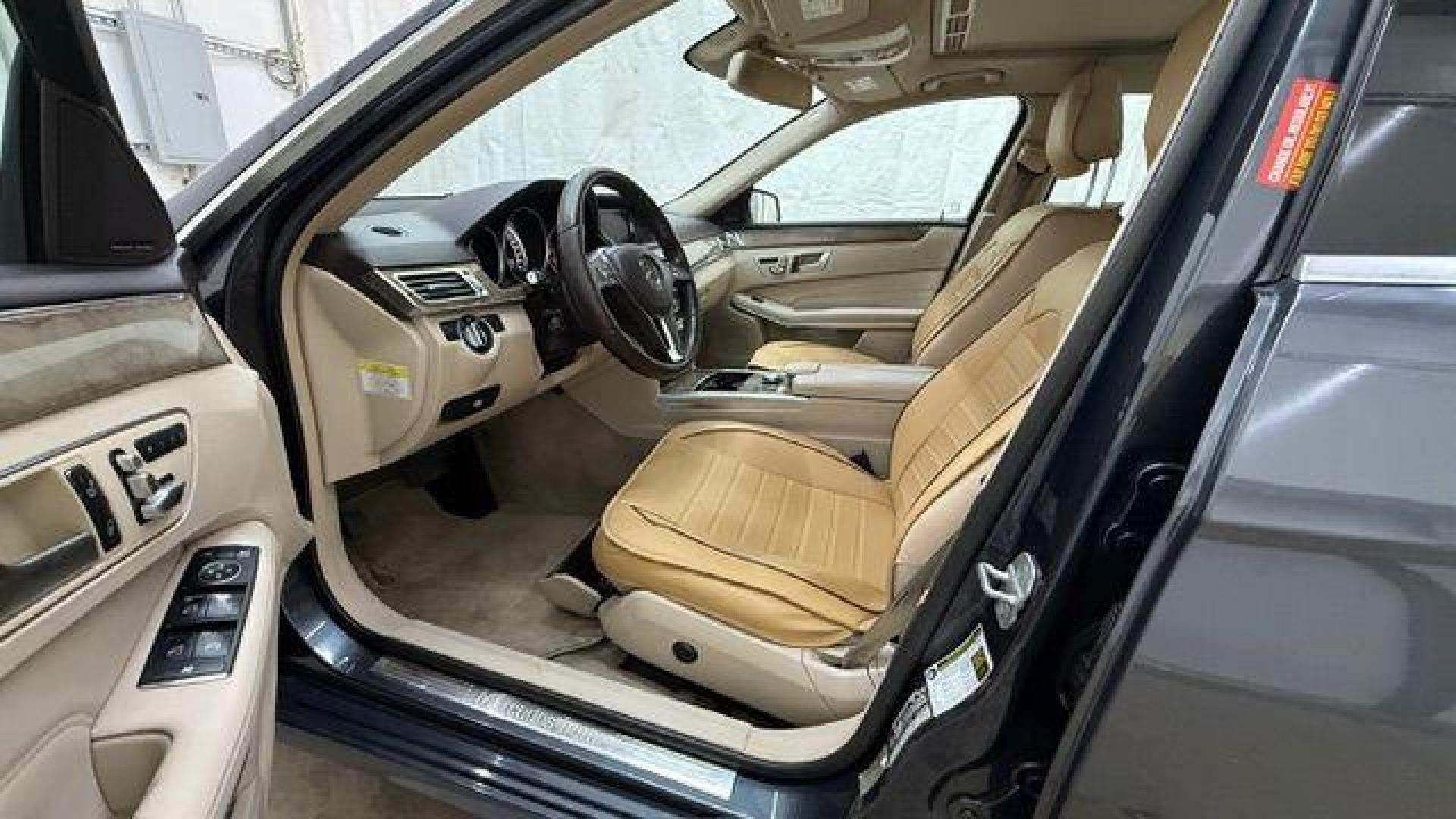 2014 Gray Mercedes-Benz E 350 4MATIC (WDDHF8JB0EA) with an 3.5L V-6 gasoline direct injection engine, located at 1806 Veterans Memorial Hwy SW, Austell, GA, 30168, (770) 944-9558, 33.817959, -84.606987 - Photo#11