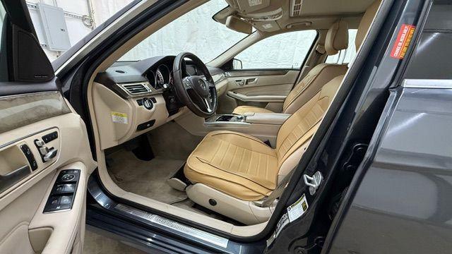 2014 Gray Mercedes-Benz E 350 4MATIC (WDDHF8JB0EA) with an 3.5L V-6 gasoline direct injection engine, located at 1806 Veterans Memorial Hwy SW, Austell, GA, 30168, (770) 944-9558, 33.817959, -84.606987 - Photo#11