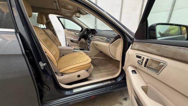 2014 Gray Mercedes-Benz E 350 4MATIC (WDDHF8JB0EA) with an 3.5L V-6 gasoline direct injection engine, located at 1806 Veterans Memorial Hwy SW, Austell, GA, 30168, (770) 944-9558, 33.817959, -84.606987 - Photo#17