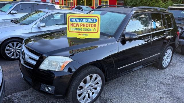 2012 Black Mercedes-Benz GLK-Class GLK350 (WDCGG5GB9CF) with an 3.5L V6 DOHC 24V engine, 7-Speed Automatic transmission, located at 1806 Veterans Memorial Hwy SW, Austell, GA, 30168, (770) 944-9558, 33.817959, -84.606987 - Photo#0