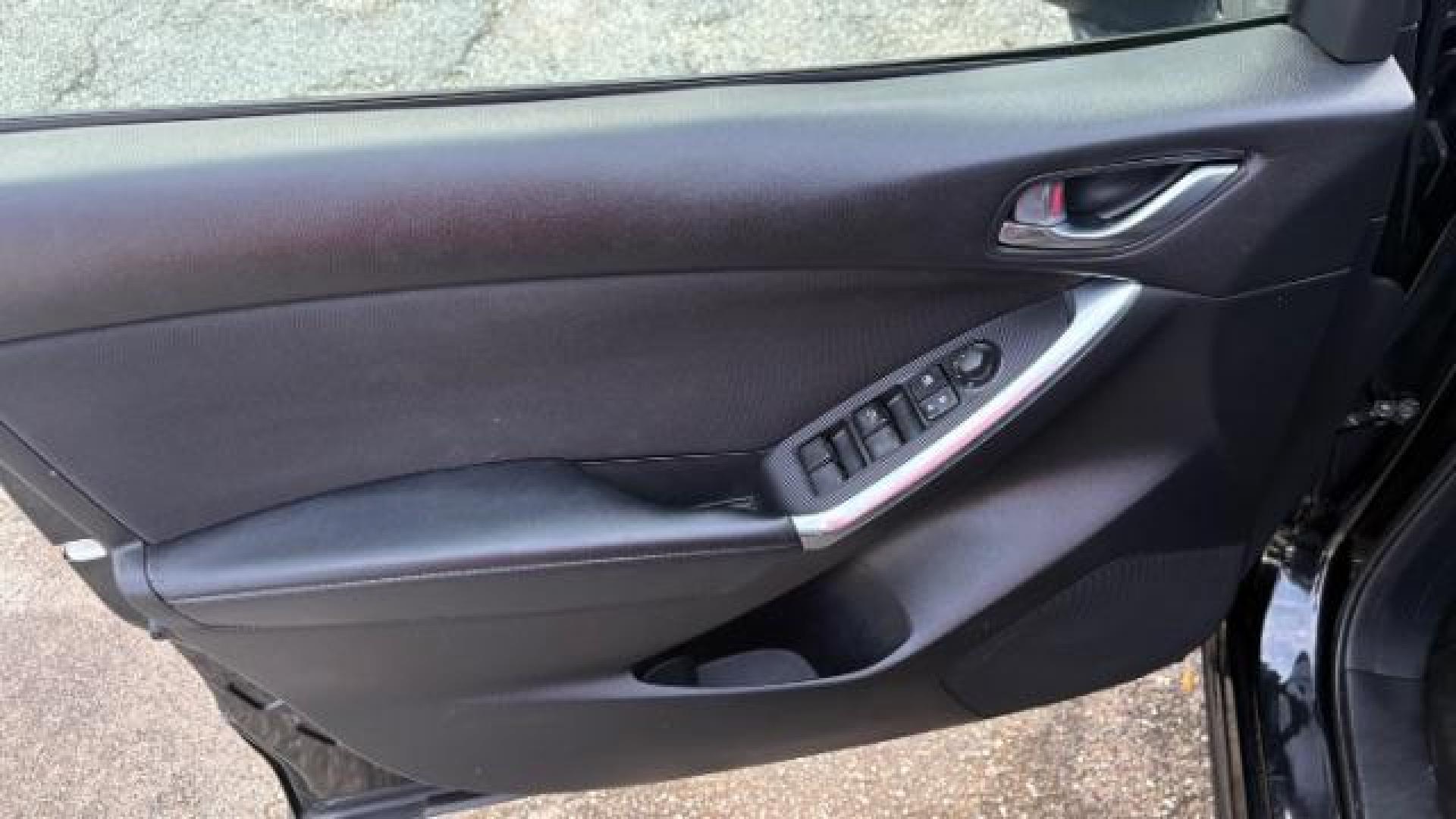 2014 Black Mazda CX-5 Touring (JM3KE2CY7E0) with an SKYACTIV-G 2.5L I-4 gasoline direct injection engine, located at 1806 Veterans Memorial Hwy SW, Austell, GA, 30168, (770) 944-9558, 33.817959, -84.606987 - Photo#8