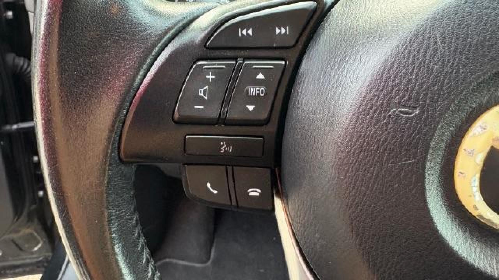 2014 Black Mazda CX-5 Touring (JM3KE2CY7E0) with an SKYACTIV-G 2.5L I-4 gasoline direct injection engine, located at 1806 Veterans Memorial Hwy SW, Austell, GA, 30168, (770) 944-9558, 33.817959, -84.606987 - Photo#9