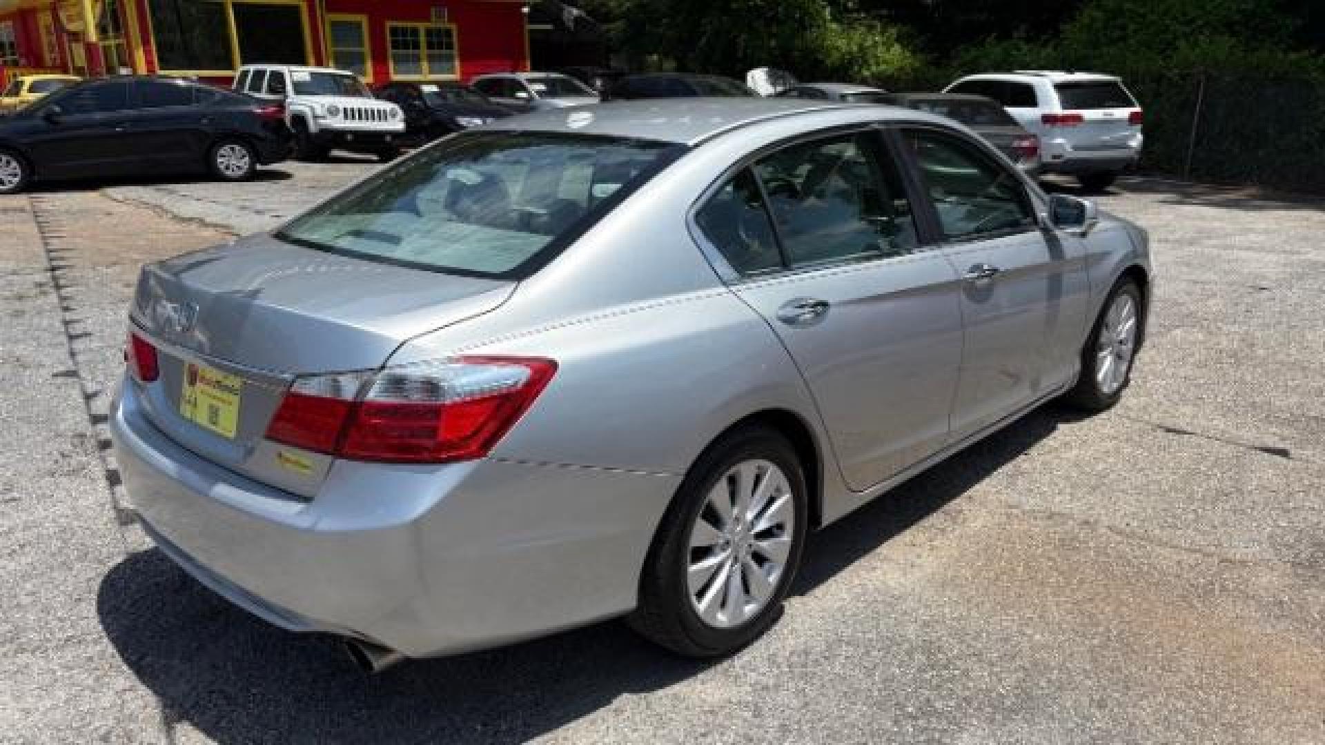 2014 Silver Honda Accord EX-L (1HGCR2F81EA) with an 2.4L I-4 gasoline direct injection engine, located at 1806 Veterans Memorial Hwy SW, Austell, GA, 30168, (770) 944-9558, 33.817959, -84.606987 - Photo#3