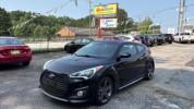 2014 Black Hyundai Veloster Turbo w/Blue (KMHTC6AE7EU) with an 1.6L I-4 gasoline direct injection engine, located at 1806 Veterans Memorial Hwy SW, Austell, GA, 30168, (770) 944-9558, 33.817959, -84.606987 - Photo#0