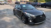 2014 Black Hyundai Veloster Turbo w/Blue (KMHTC6AE7EU) with an 1.6L I-4 gasoline direct injection engine, located at 1806 Veterans Memorial Hwy SW, Austell, GA, 30168, (770) 944-9558, 33.817959, -84.606987 - Photo#2