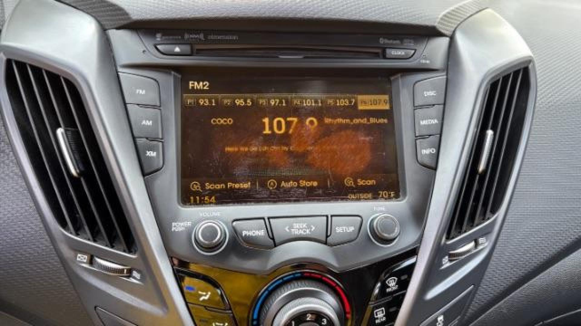 2014 Black Hyundai Veloster Turbo w/Blue (KMHTC6AE7EU) with an 1.6L I-4 gasoline direct injection engine, located at 1806 Veterans Memorial Hwy SW, Austell, GA, 30168, (770) 944-9558, 33.817959, -84.606987 - Photo#7