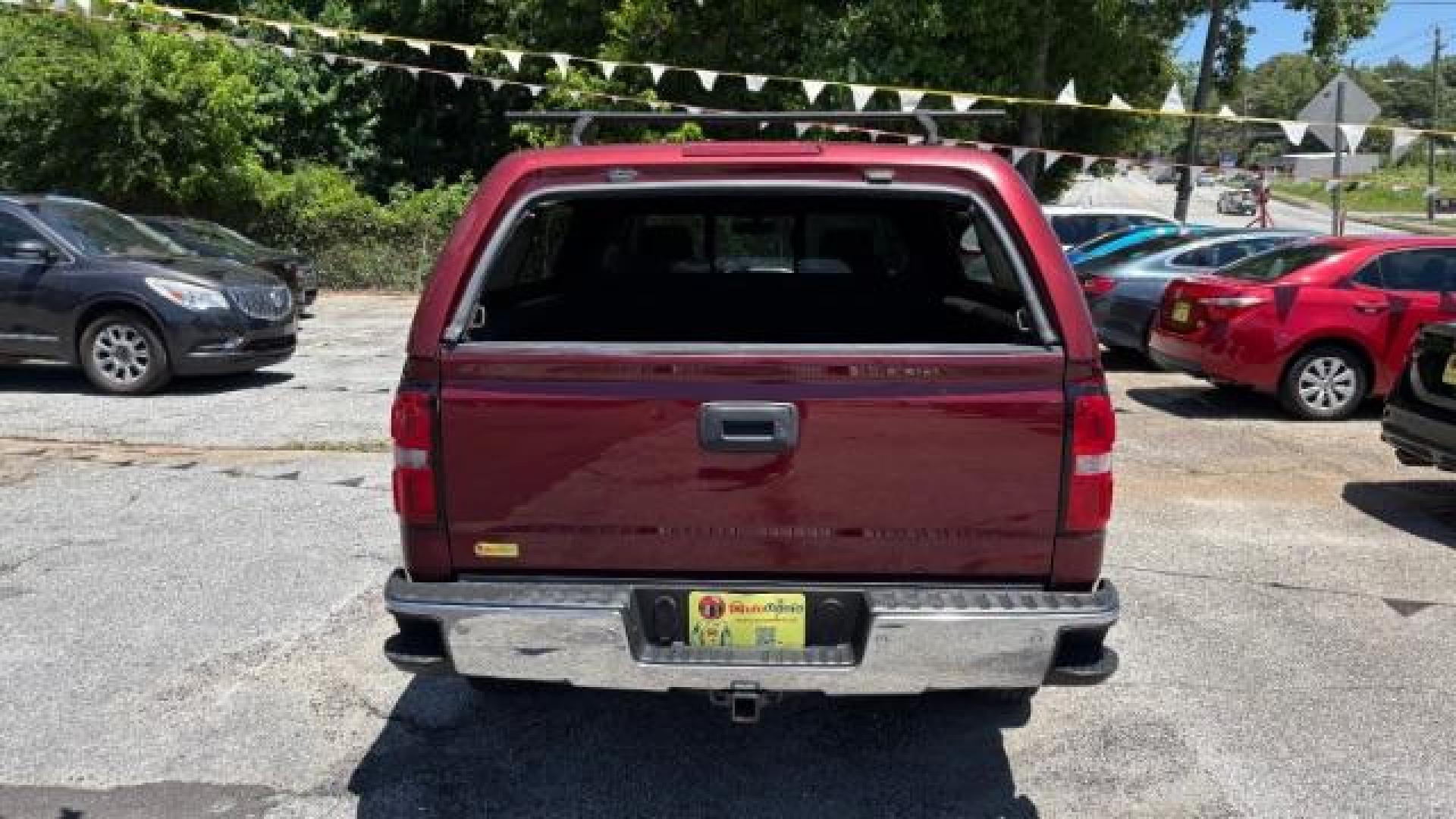 2014 Maroon GMC Sierra 1500 SLE (1GTV2UEC4EZ) with an EcoTec3 5.3L V-8 gasoline direct injection engine, Automatic transmission, located at 1806 Veterans Memorial Hwy SW, Austell, GA, 30168, (770) 944-9558, 33.817959, -84.606987 - Photo#4