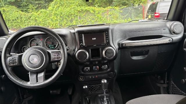 2017 Black Jeep Wrangler Unlimited Sport 4x4 (1C4BJWDG1HL) with an Pentastar 3.6L V-6 DOHC engine, located at 1806 Veterans Memorial Hwy SW, Austell, GA, 30168, (770) 944-9558, 33.817959, -84.606987 - Photo#8