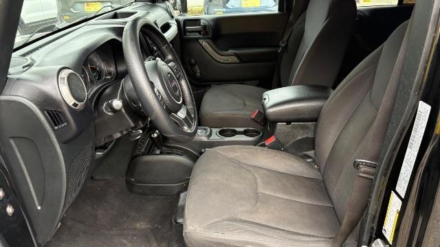 2017 Black Jeep Wrangler Unlimited Sport 4x4 (1C4BJWDG1HL) with an Pentastar 3.6L V-6 DOHC engine, located at 1806 Veterans Memorial Hwy SW, Austell, GA, 30168, (770) 944-9558, 33.817959, -84.606987 - Photo#10