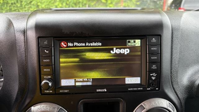 2017 Black Jeep Wrangler Unlimited Sport 4x4 (1C4BJWDG1HL) with an Pentastar 3.6L V-6 DOHC engine, located at 1806 Veterans Memorial Hwy SW, Austell, GA, 30168, (770) 944-9558, 33.817959, -84.606987 - Photo#12