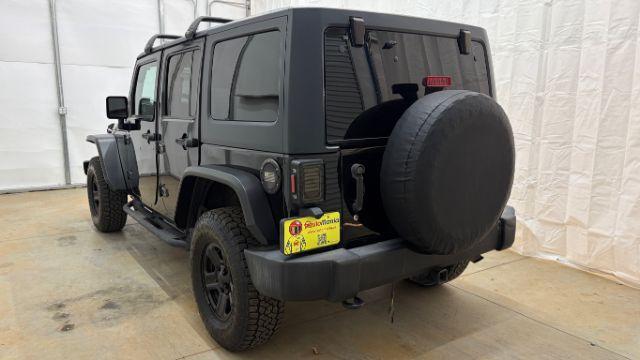 2017 Black Jeep Wrangler Unlimited Sport 4x4 (1C4BJWDG1HL) with an Pentastar 3.6L V-6 DOHC engine, located at 1806 Veterans Memorial Hwy SW, Austell, GA, 30168, (770) 944-9558, 33.817959, -84.606987 - Photo#3